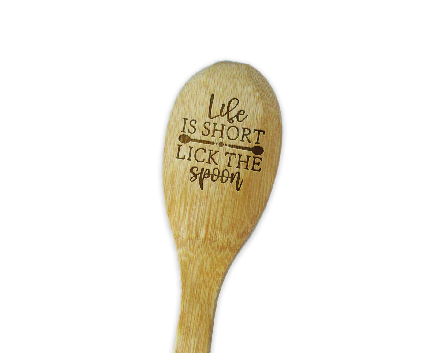 a wooden spoon with the words life is short lick the spoon