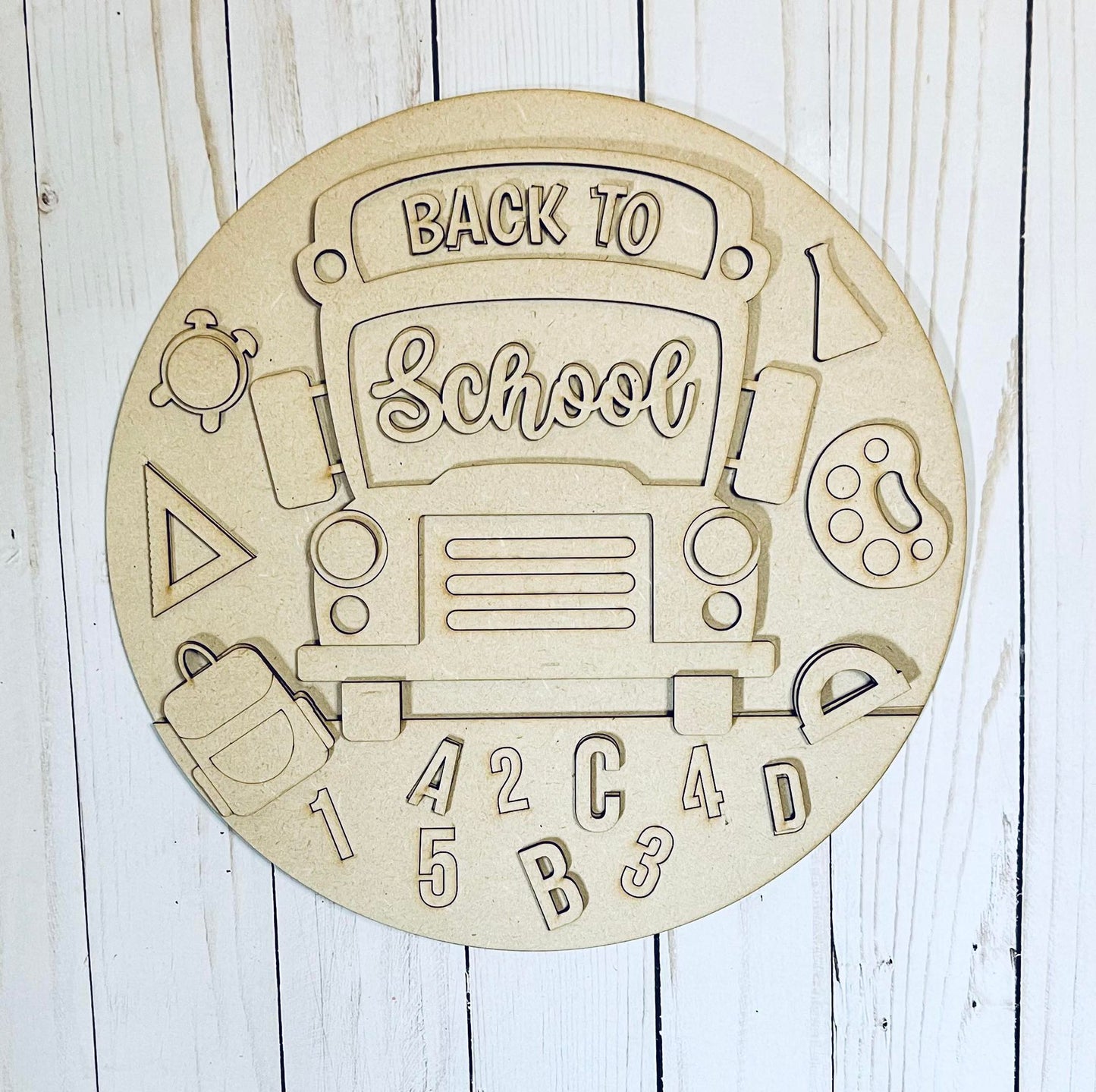 a picture of a back to school sign on a wall