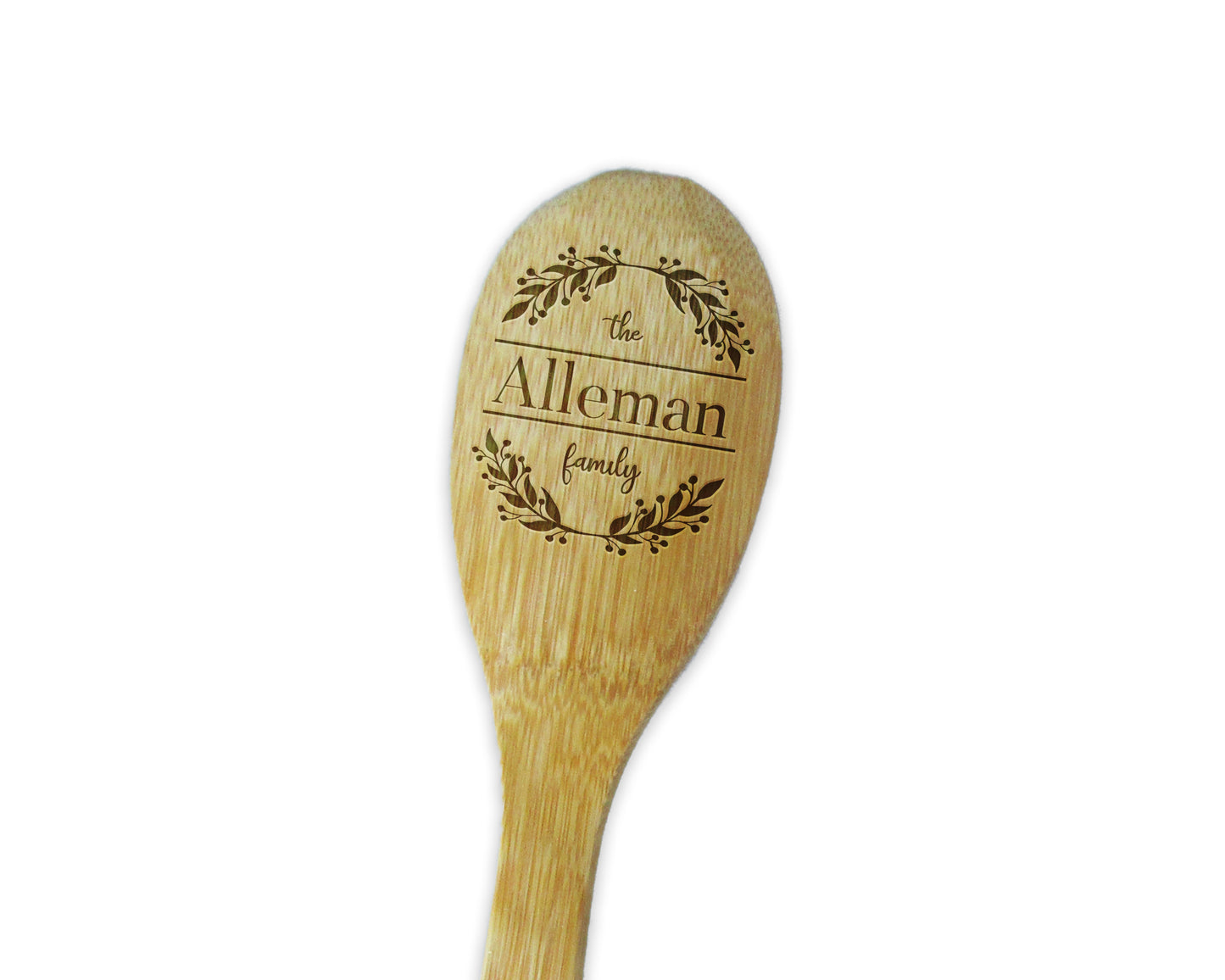 a wooden spoon with the name of a person on it