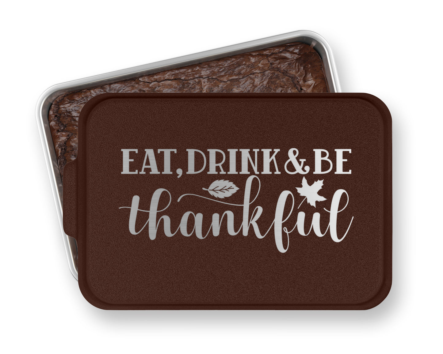 a tin of brownies with the words eat, drink and be grateful on it