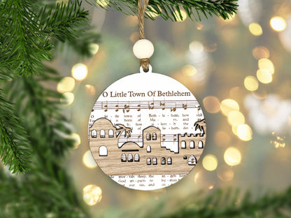 a wooden ornament hanging from a christmas tree