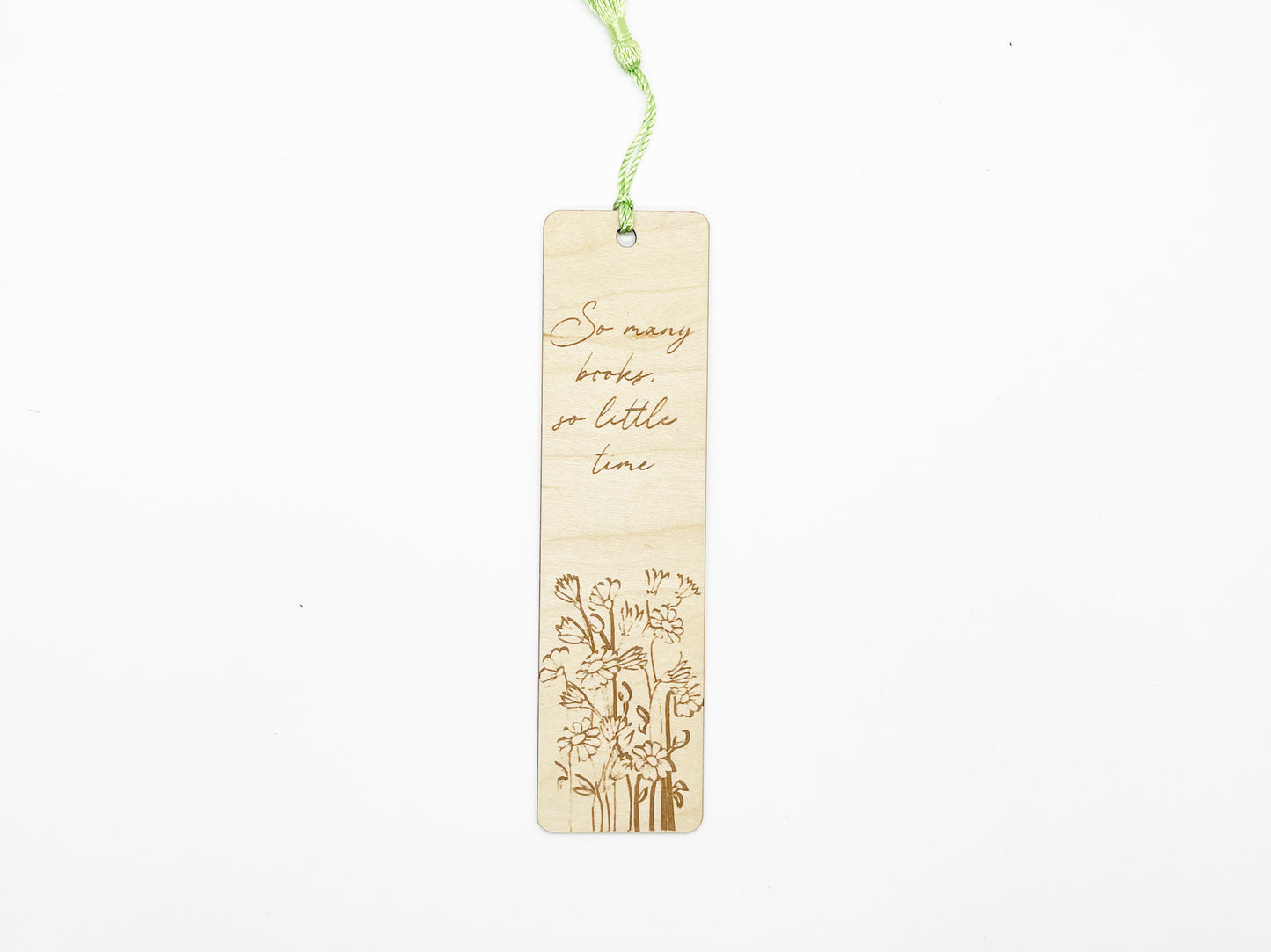 a wooden bookmark with a picture of a tree