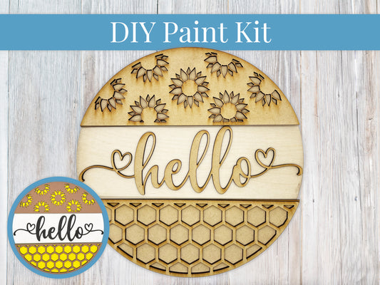 a wooden cutout of a hello hello sign