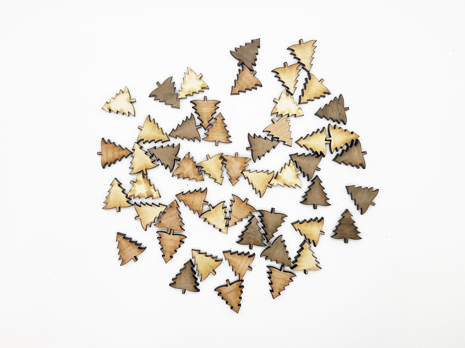 a group of wooden triangles sitting on top of a white surface