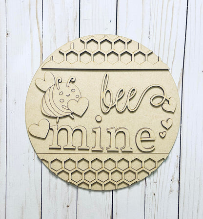 a wooden sign that says bee and mine on it