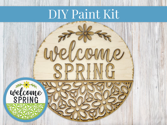 a welcome spring sign with a welcome spring sticker