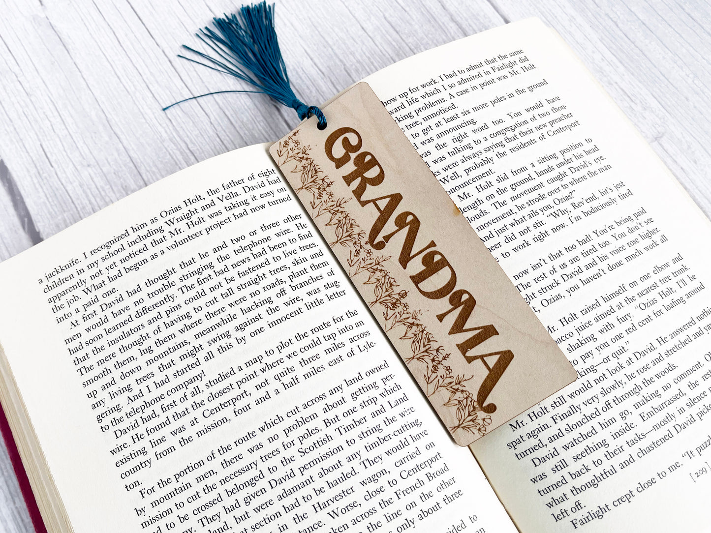 an open book with a bookmark on it