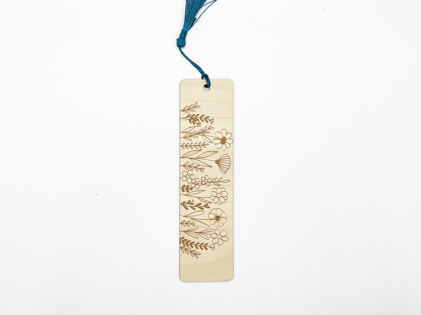 a bookmark with a blue string hanging from it