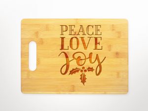 peace-love-joy-holly-leaves-cutting-board
